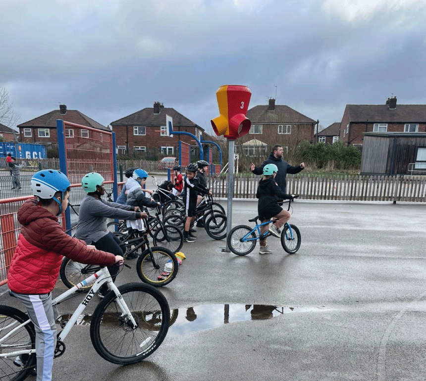 Children taking part in free cycle skills session with British Cycling over half term