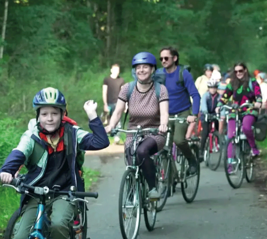 Primary School 'Bike Bus' with families riding together on way to school