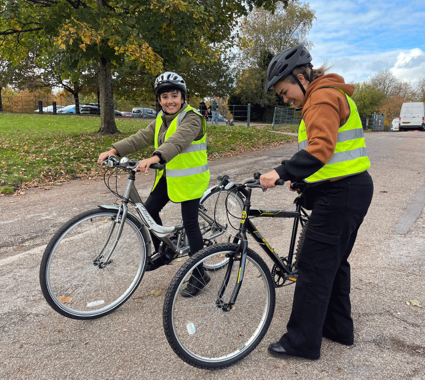 Two people on bikes at Heaton park in manchester